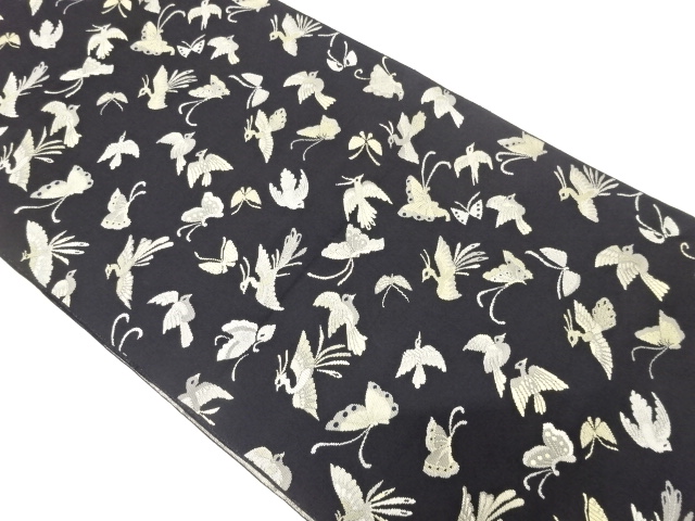 鳥に蝶模様織り出し　名古屋帯